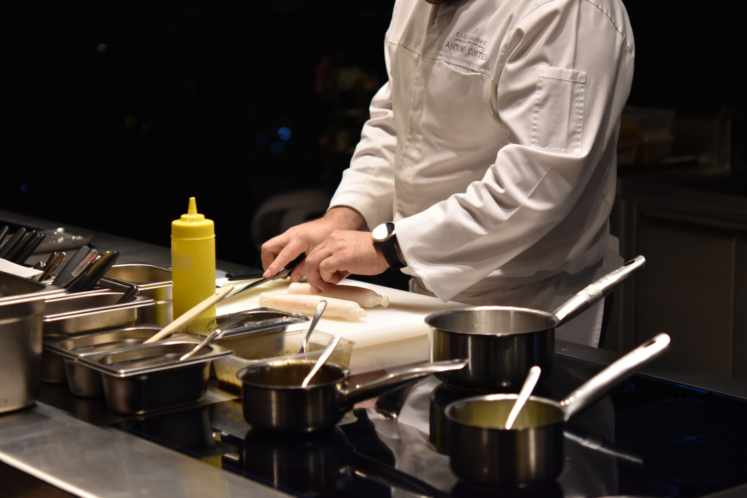chef cooking in professional kitchen in Bangkok